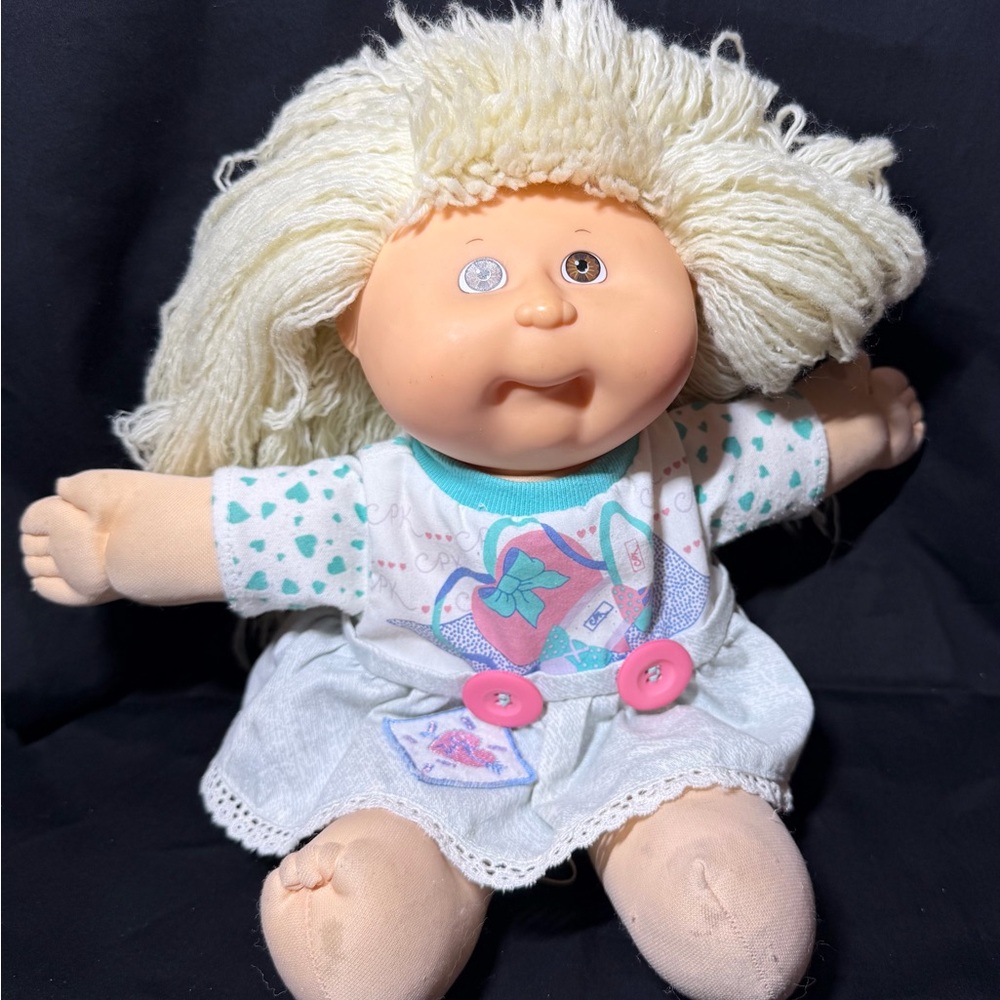 Adorable Cream Doll with Blonde Hair and Heart Dress